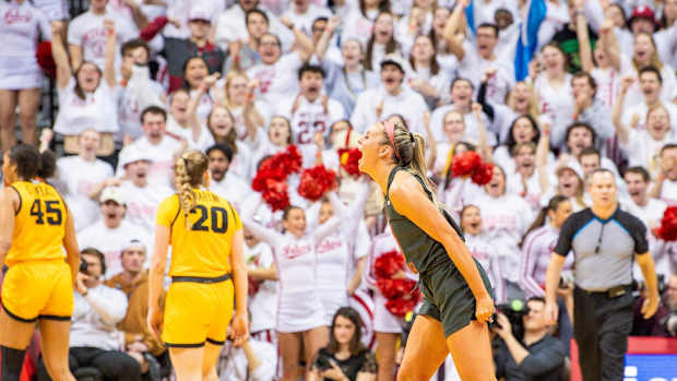 Indiana's Sydney Parrish (33) celebrates during the first half of the Indiana versus Iowa women's basketball game at Simon Skjodt Assembly Hall on Thursday, Feb. 22, 2024.